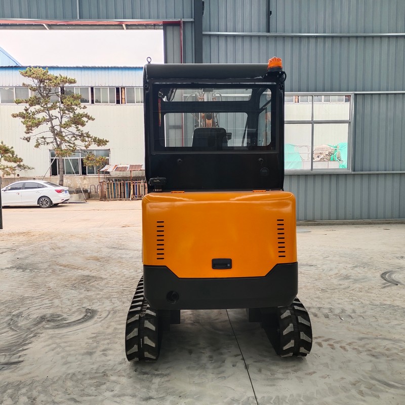 Компактный экскаватор